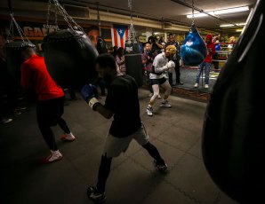 HILLCREST HEIGHTS, MD - NOVEMBER 15: Light middleweight world champion Jarrett Hurd (in white) works out at the Hillcrest Boxing Gym in Hillcrest Heights, MD on November 15, 2018. (Photo by Will Newton for The Washington Post)