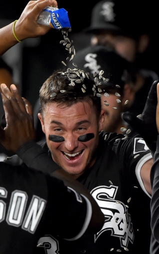 BALTIMORE, MD - APRIL 22: James McCann #33 of the Chicago White Sox celebrates with teammates after hitting a three-run home run in the fifth inning against the Baltimore Orioles at Oriole Park at Camden Yards on April 22, 2019 in Baltimore, Maryland. (Photo by Will Newton/Getty Images)