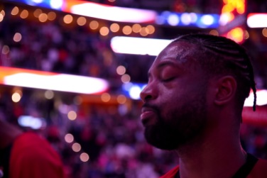 WASHINGTON, DC - MARCH 23: Dwyane Wade #3 of the Miami Heat looks on as the National Anthem plays prior to the game between the Washington Wizards and Miami Heat at Capital One Arena on March 23, 2019 in Washington, DC. NOTE TO USER: User expressly acknowledges and agrees that, by downloading and or using this photograph, User is consenting to the terms and conditions of the Getty Images License Agreement. (Photo by Will Newton/Getty Images)