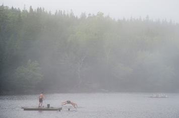 ISLE AU HAUT, ME - AUGUST 11: A family enjoys swimming on Long Pond on Isle au Haut, ME on August 11, 2020. (Photo by Will Newton/Friends of Acadia)